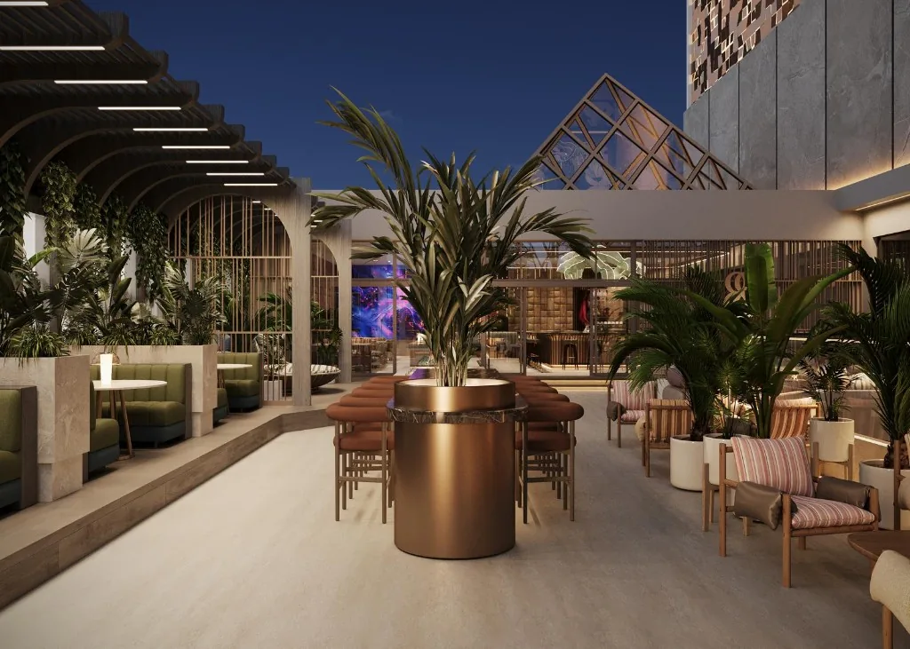 Vonku lounge kreslá Oasis Garden pod kvitnúcou pergolou