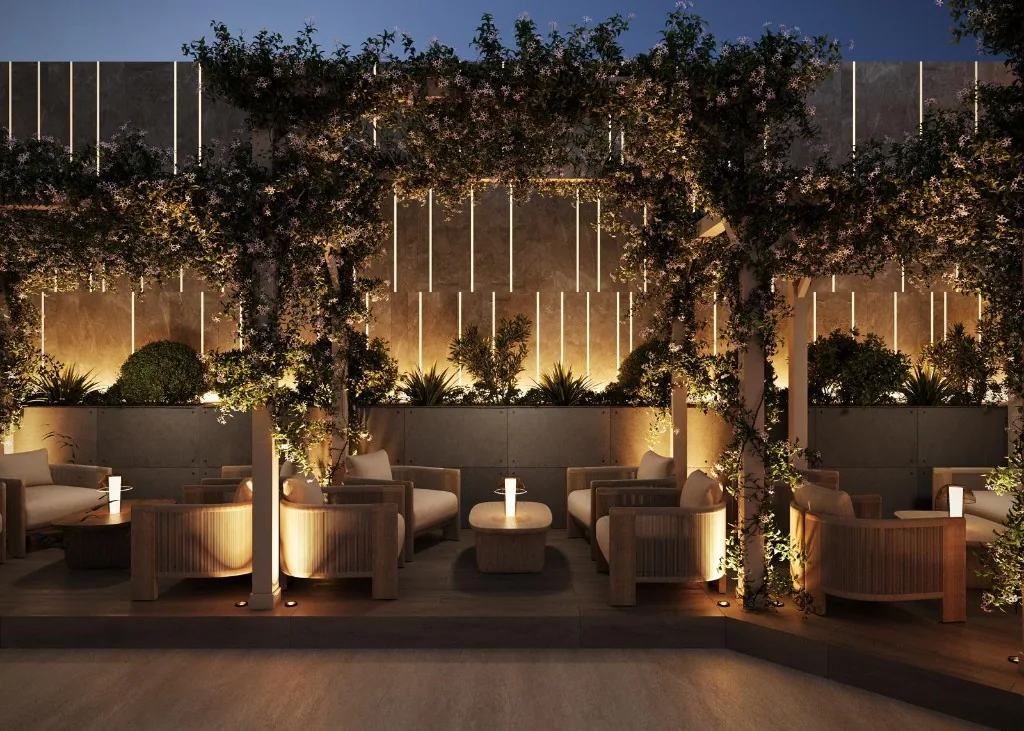 Vnútorné boothy Oasis Garden s klenutým dreveným stropom a palmovými zástenami