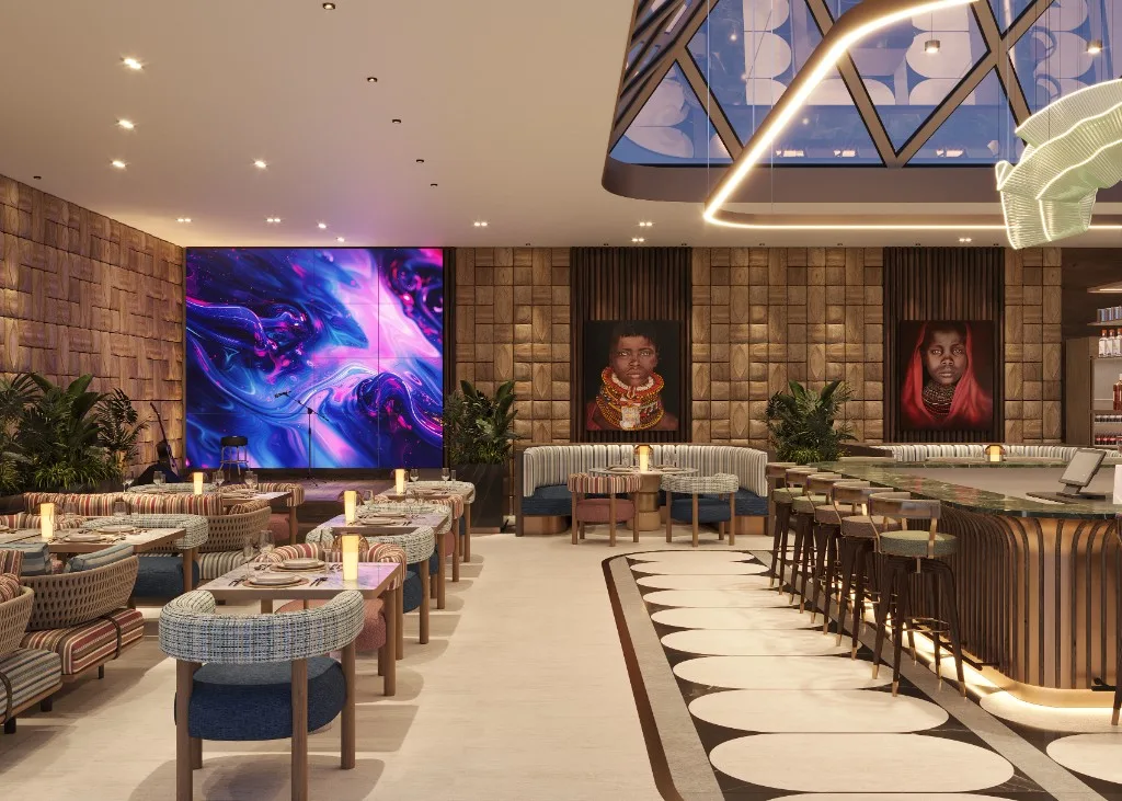 Spoločenský dining lounge 88 Nairobi s barovým sedením a osvetlenými interiérmi